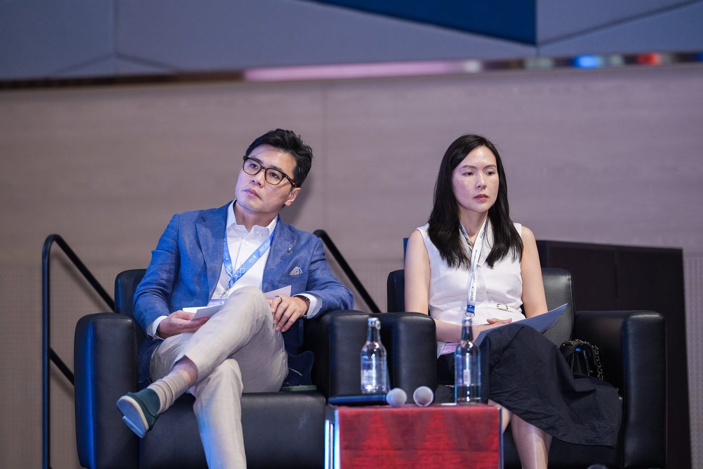 Dr Ong Jin Khang seated on stage as a session chairperson at AMSC 2026, Kuala Lumpur Convention Centre