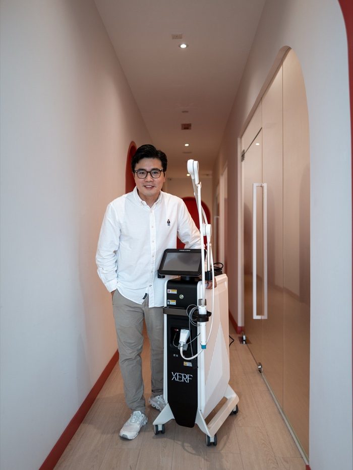 Dr Ong Jin Khang with the newly delivered XERF console in the clinic corridor